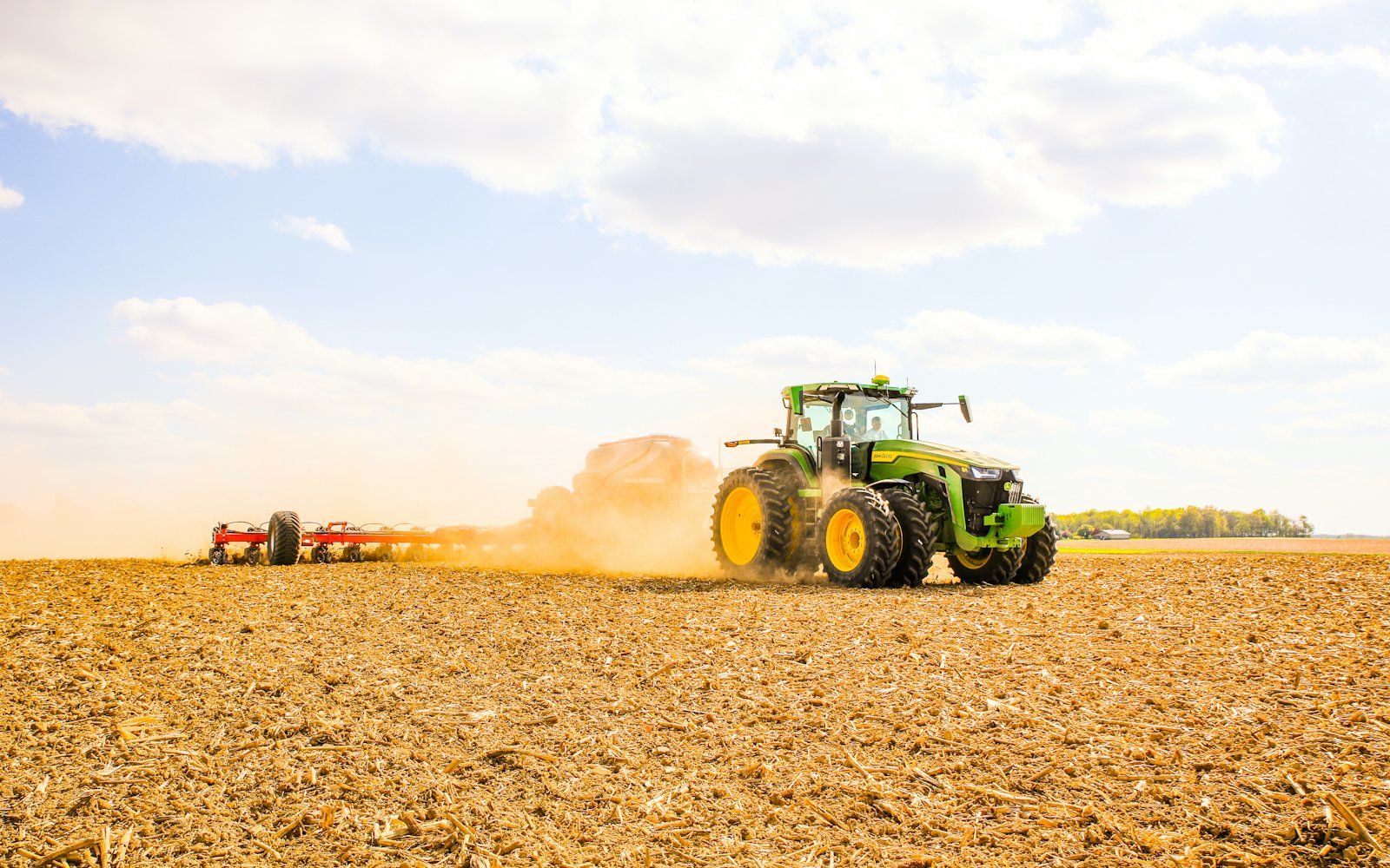 A tractor working a farm field